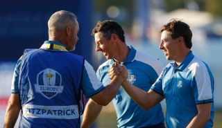 Rory McIlroy and Matt Fitzpatrick shake hands after their Ryder Cup win