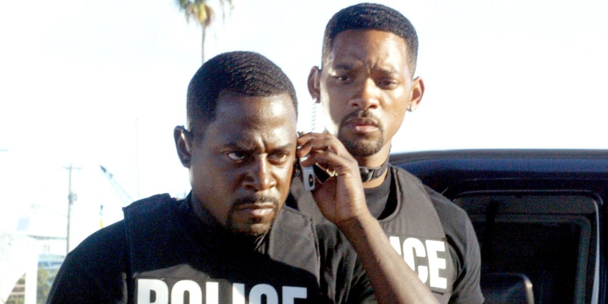 Bad Boys II Martin Lawrence takes an phone call angrily, with Will Smith looking on worried