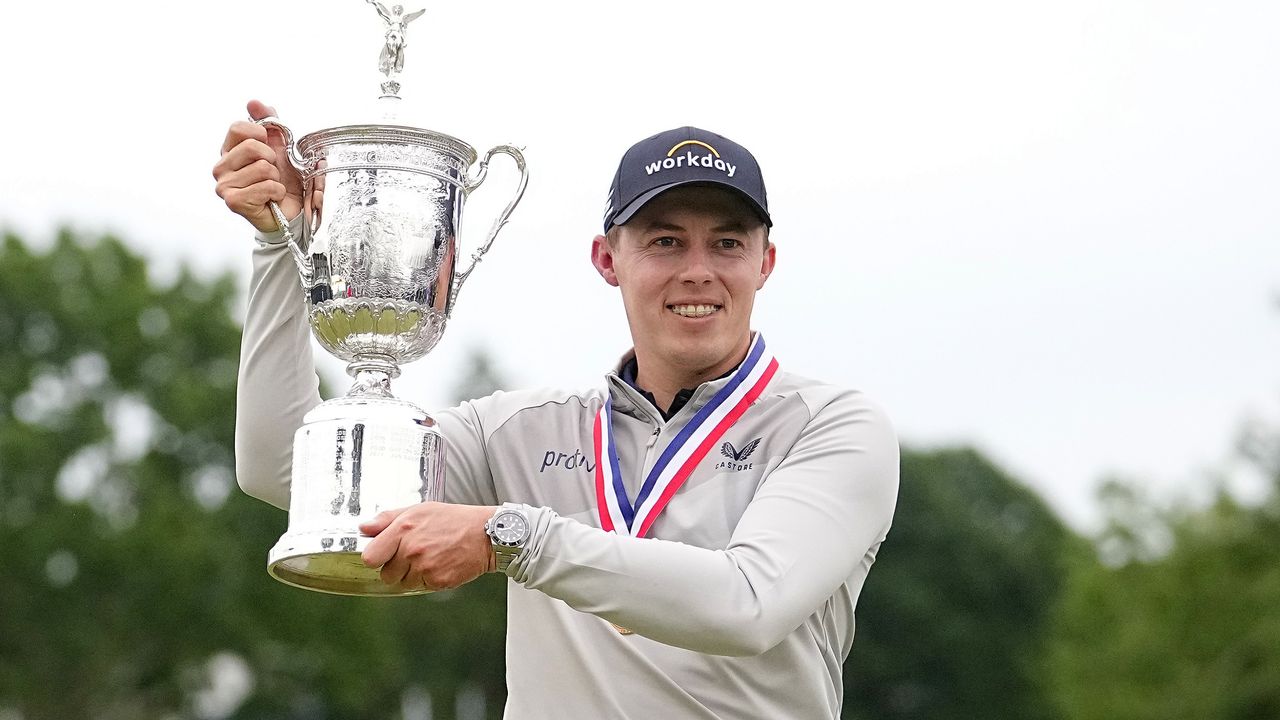 Matt Fitzpatrick holds up the US Open trophy at Brookline