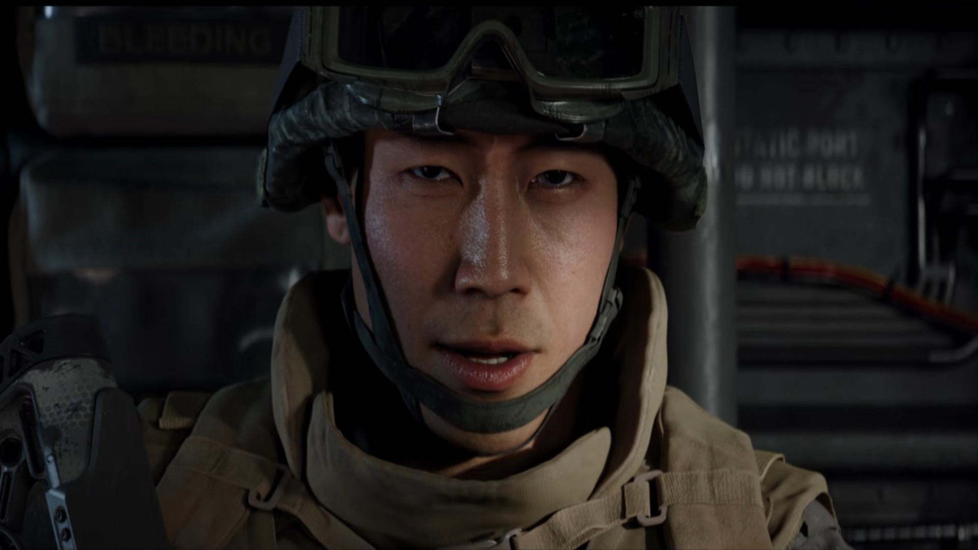 Playable character Private Park, a South Korean solider, sits in a helicopter in armored gear in Call of Duty Modern Warfare 4 