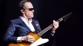 American blues rock musician Joe Bonamassa performing live on stage at the Royal Albert Hall in London, on March 30, 2013.