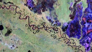 Green and blue shapes over dark backgrounds