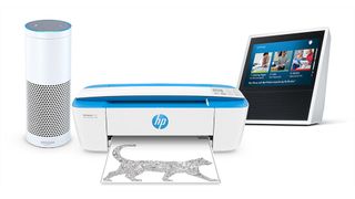 HP printer against a white background next to an Amazon Echo and a smart screen