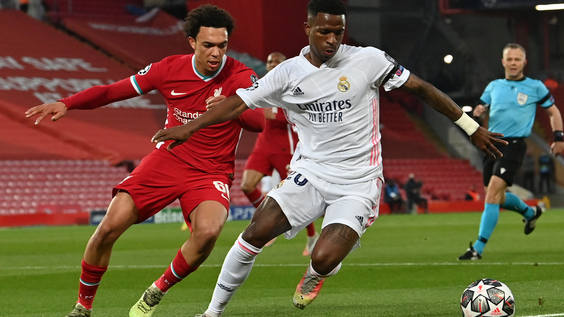 Liverpool's English defender Trent Alexander-Arnold (L) vies with Real Madrid's Brazilian forward Vinicius Junior during the UEFA Champions League
