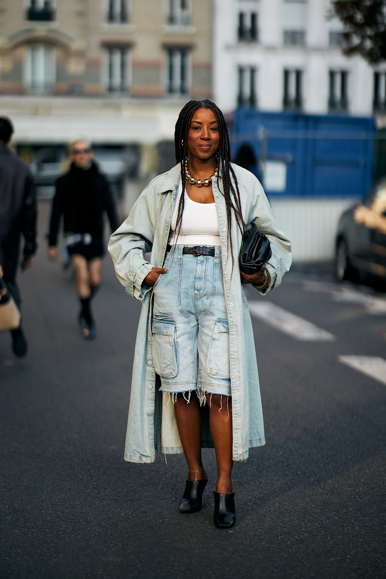 woman at fashion week wearing a chunky beaded necklace