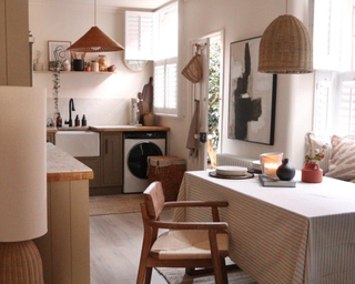 Small kitchen with dining table and pendant light