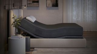 Eight Sleep Pod 4 Ultra on a bed in a bedroom, it's angled, showing off the special, shape sensitive features of the topper