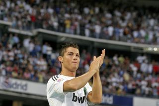 Cristiano Ronaldo applauds the Real Madrid fans at his official presentation in July 2009.