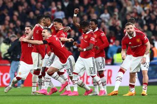 Diogo Dalot of Manchester United celebrates after the team's victory in the penalty shoot out during the Emirates FA Cup Semi Final match between Brighton & Hove Albion and Manchester United at Wembley Stadium on April 23, 2023 in London, England. (Photo by Clive Rose/Getty Images)