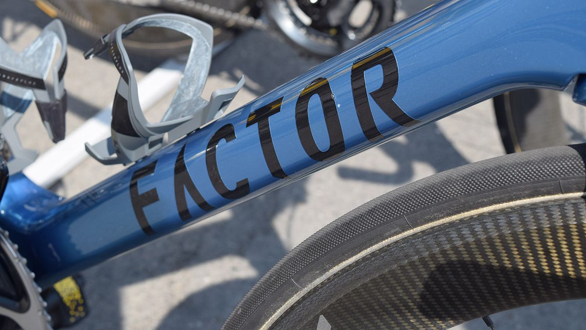 Black decals contrast against the blue metallic finish
