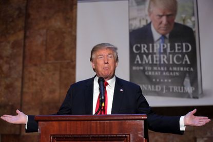 Donald Trump at a press conference before a book signing.