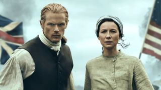 Sam Heughan and Caitriona Balfe dressed in 18th century clothing in Outlander