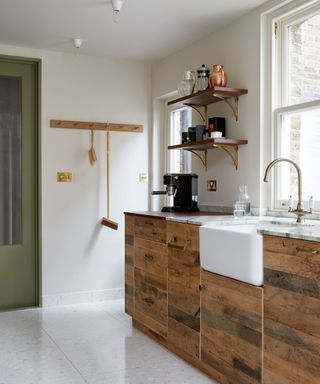 wooden kitchen cabinets and large butlers sink