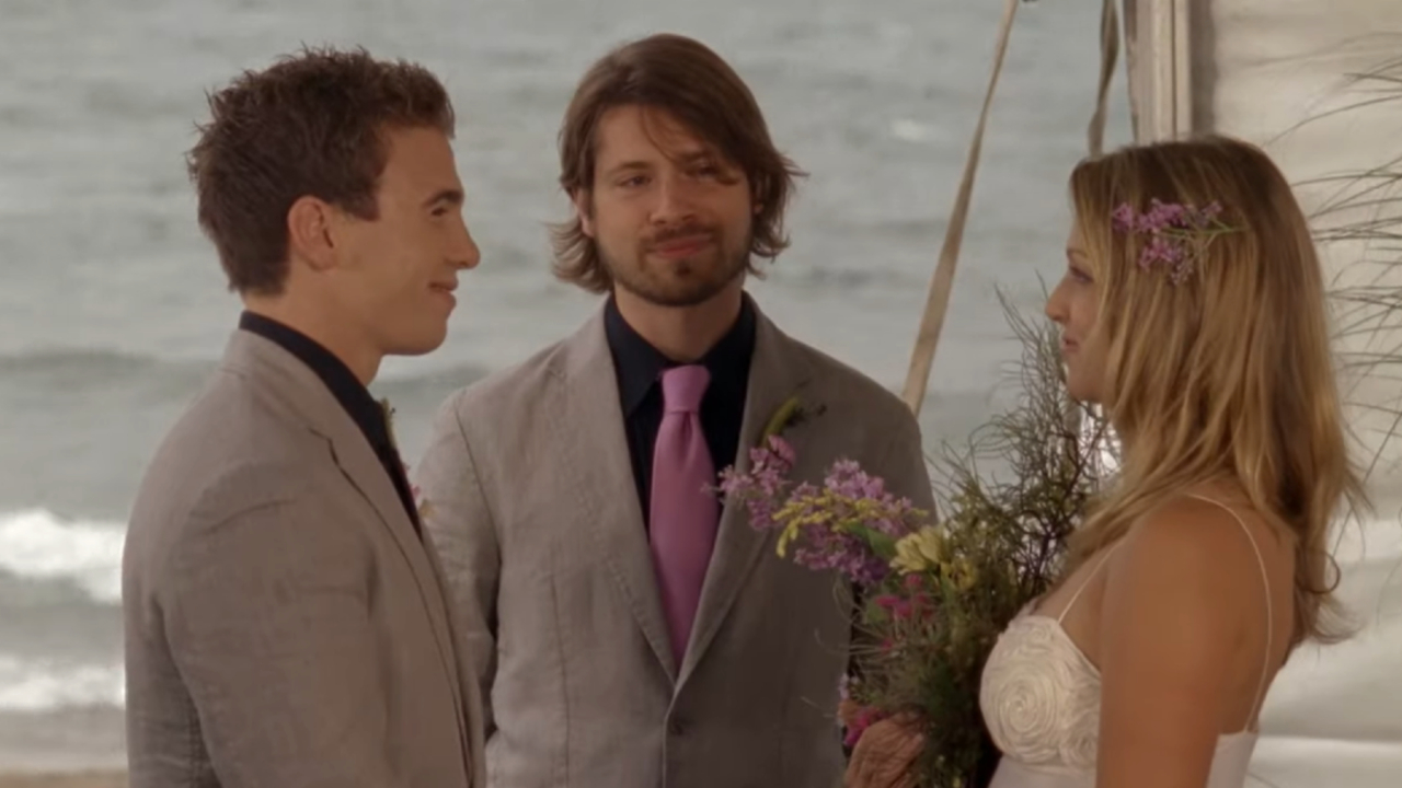 Jay (Mike Lobel) marries Emma (Miriam McDonald) and Spinner (Shane Kippel) in Degrassi Takes Manhatten.