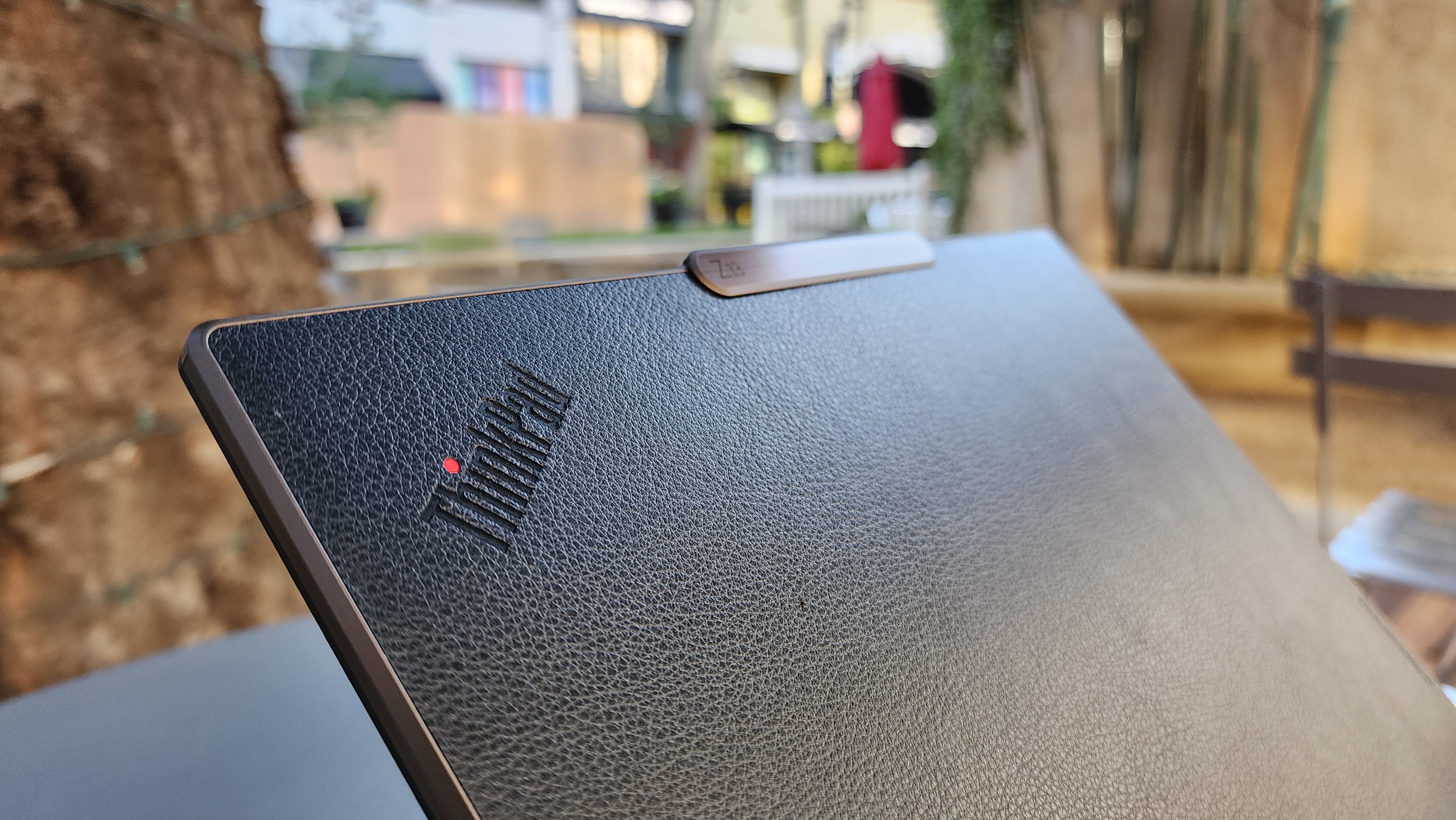 Lenovo ThinkPad branding on Z13 laptop lid.