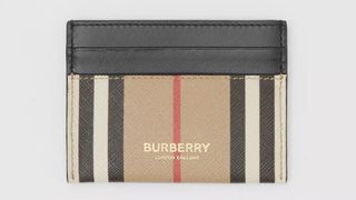 Best designer card holders include: Burberry Icon Stripe E-canvas and Leather Card Case