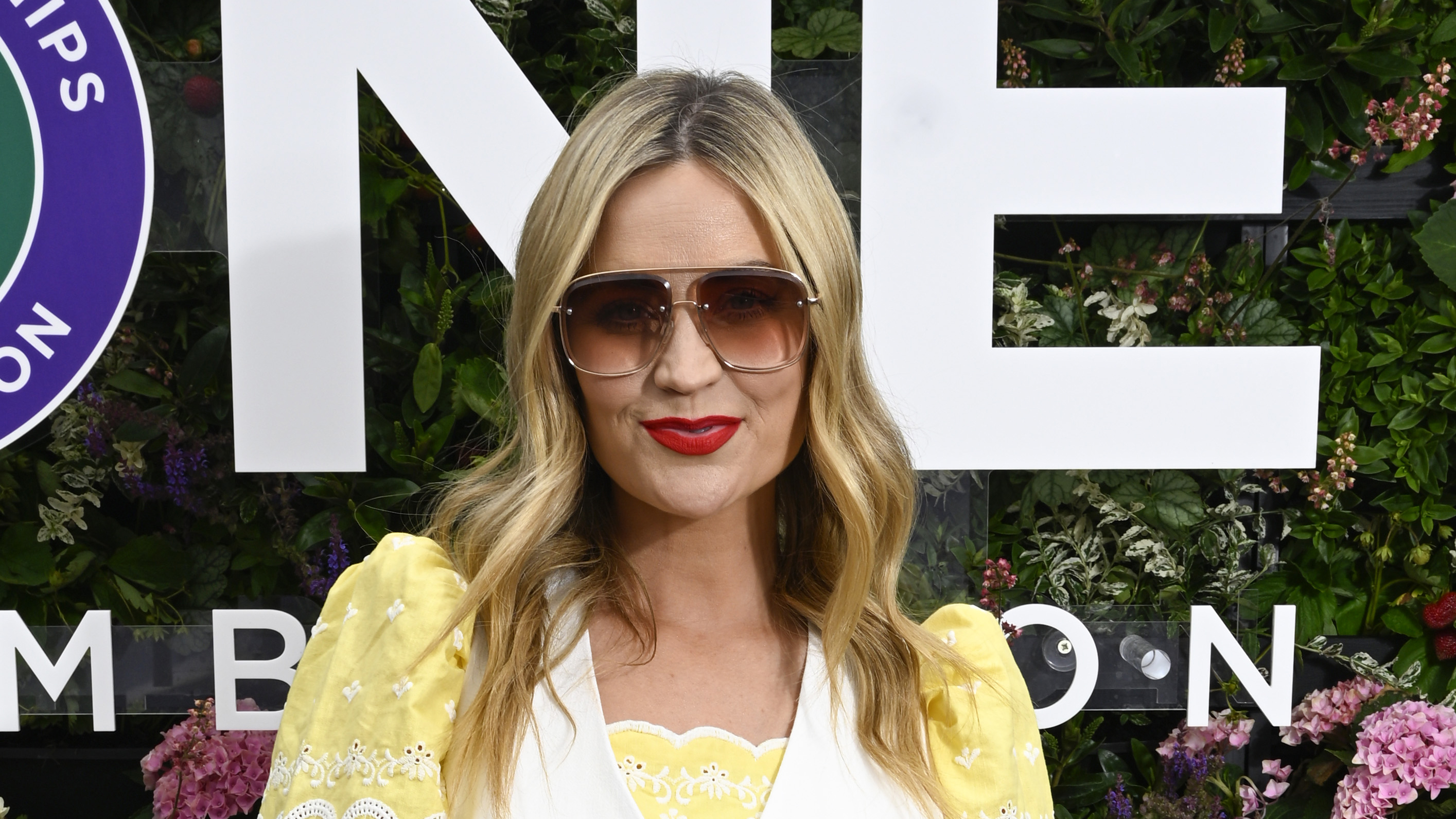 Laura Whitmore wearing squared sunglasses