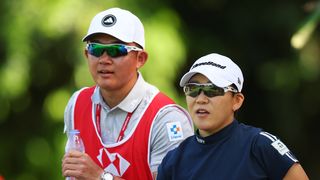 Jiyai Shin and her caddie at the HSBC Women's World Championship