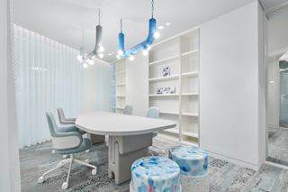 Meeting room with grey and light blue furniture
