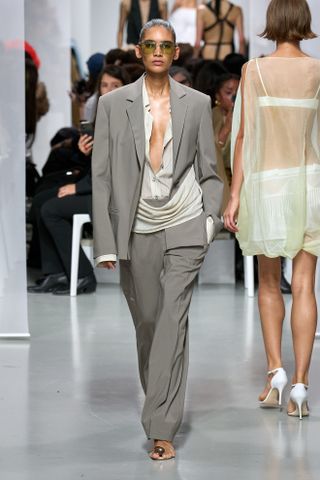 christopher esber draped shirt and grey trouser suit at paris fashion week spring summer 2025