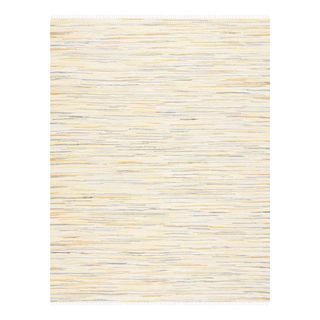 A white rug with colorful lines