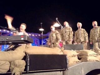 Gary Barlow performs for the troops at Camp Bastion