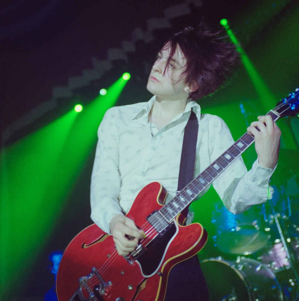 Richard Oakes on stage with Suede at London's Kilburn National Ballroom, October 1996