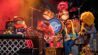 The Electric Mayhem performing in The Muppets Mayhem