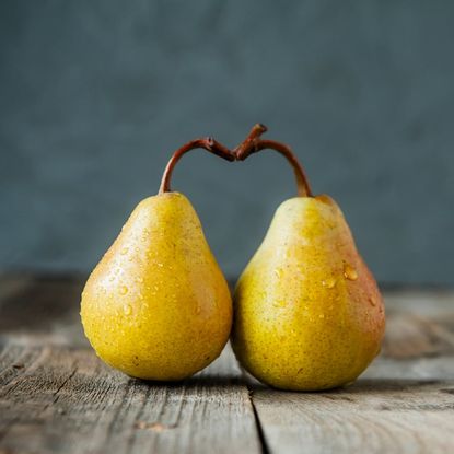 Two Pears Covered In Water Droplets