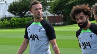 Jordan Henderson and Mohamed Salah of Liverpool just back at training at AXA Training Centre on July 11, 2023 in Kirkby, England.