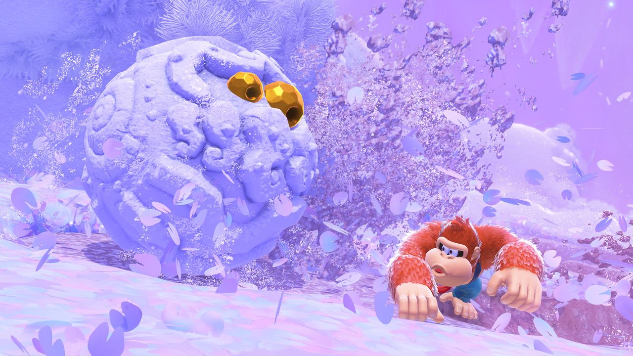 Donkey Kong looks concerned looking at an icy enemy in a snowy biome in Donkey Kong Bananza