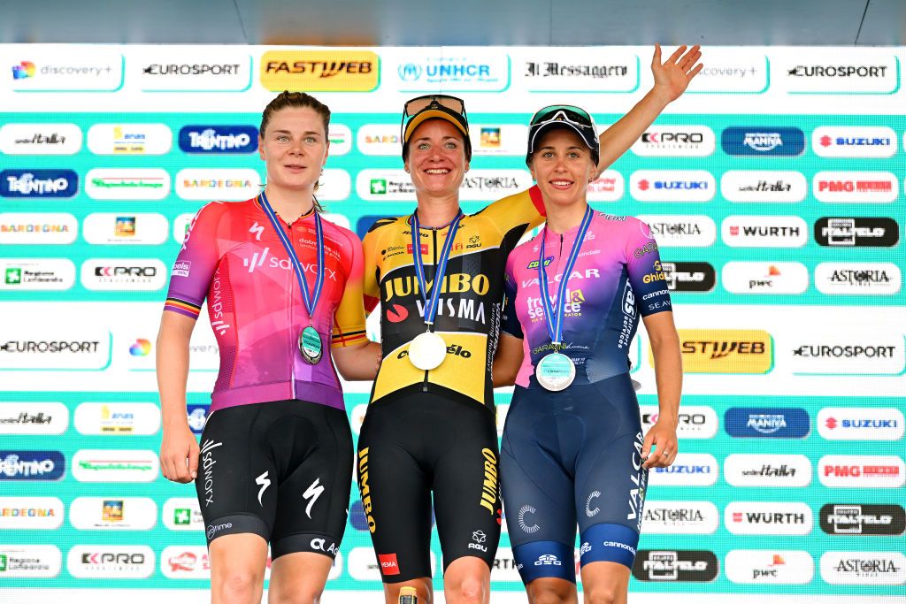BERGAMO ITALY JULY 06 LR Lotte Kopecky of Belgium and Team SD Worx on second place race winner Marianne Vos of Netherlands and Jumbo Visma Team and Silvia Persico of Italy and Valcar Travel Service Team on third place pose on the podium ceremony after the 33rd Giro dItalia Donne 2022 Stage 6 a 1147km stage from Sarnico to Bergamo GiroDonne UCIWWT on July 06 2022 in Bergamo Italy Photo by Dario BelingheriGetty Images