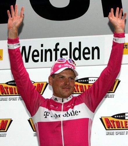 Jan Ullrich (T-Mobile) salutes from the podium as the winner of stage 2