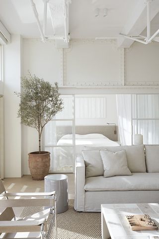 Wharf Apartment white interior with sofa