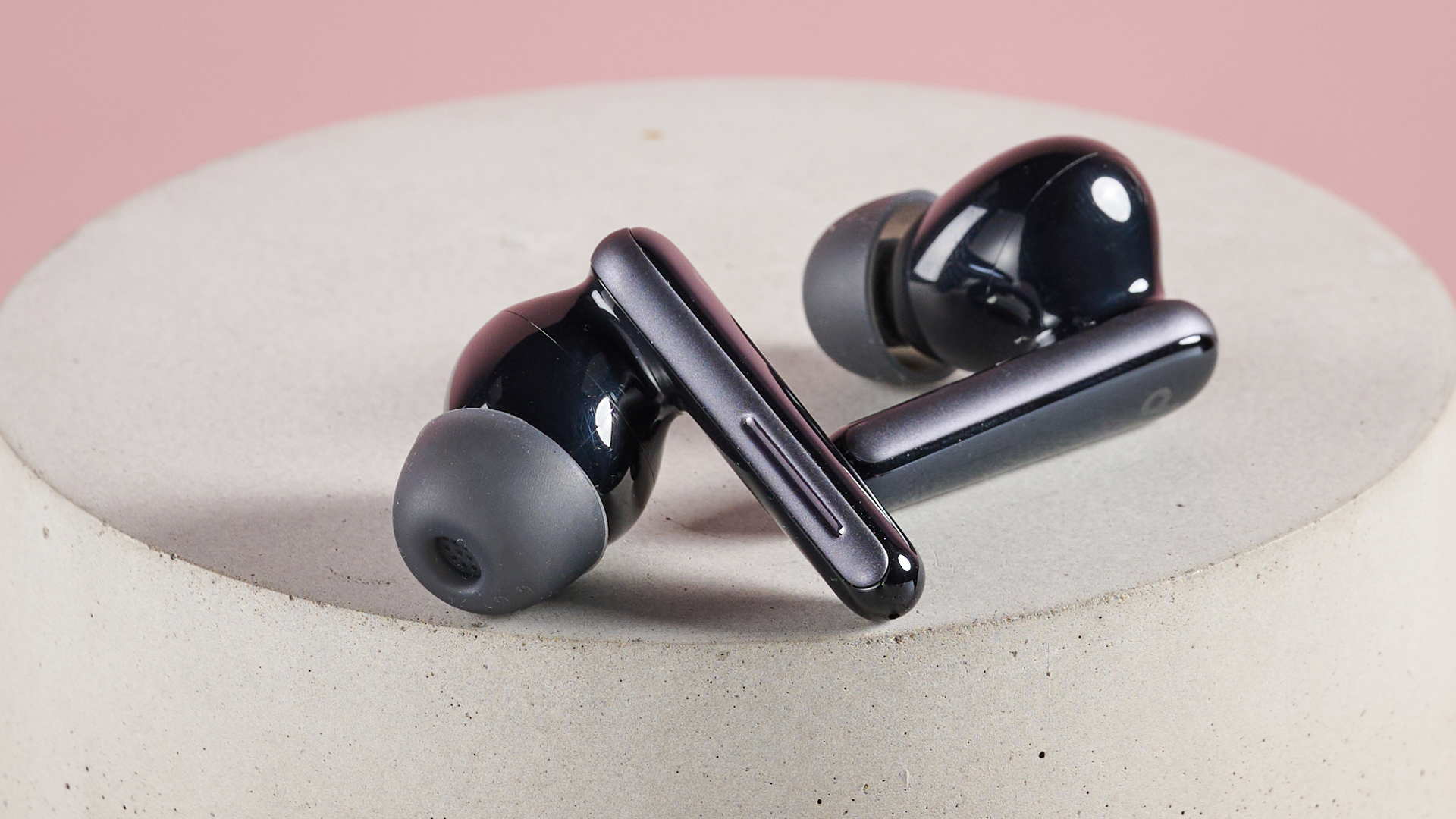 Anker Soundcore Liberty 5 buds on circular surface