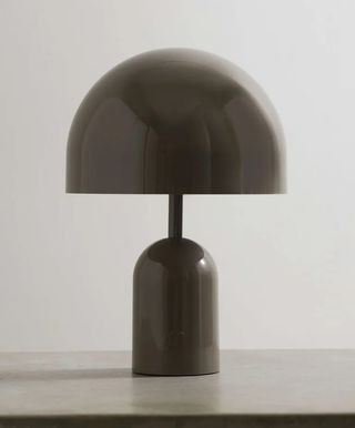 Vintage lamp with mushroom shaped black shade and body.