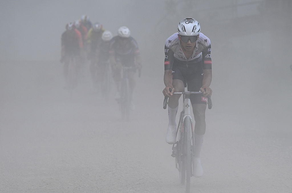 SIENA ITALY MAY 18 Isaac Del Toro of Mexico and Team UAE Team Emirates XRG competes in the chase group passing through a gravel strokes sector during the 108th Giro dItalia 2025 Stage 9 a 181km stage from Gubbio to Siena UCIWT on May 18 2025 in Siena Italy Photo by Tim de WaeleGetty Images