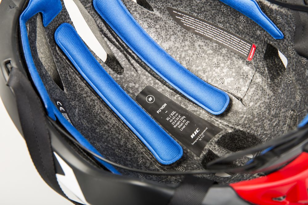 The best cycling helmets come with removable padding so they can be washed. This image shows the inside of a helmet with blue padding