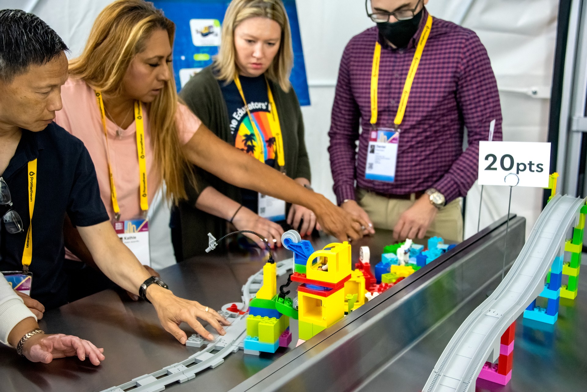 Visitors participate in a hands-on Lego experience at Kennedy Space Center.