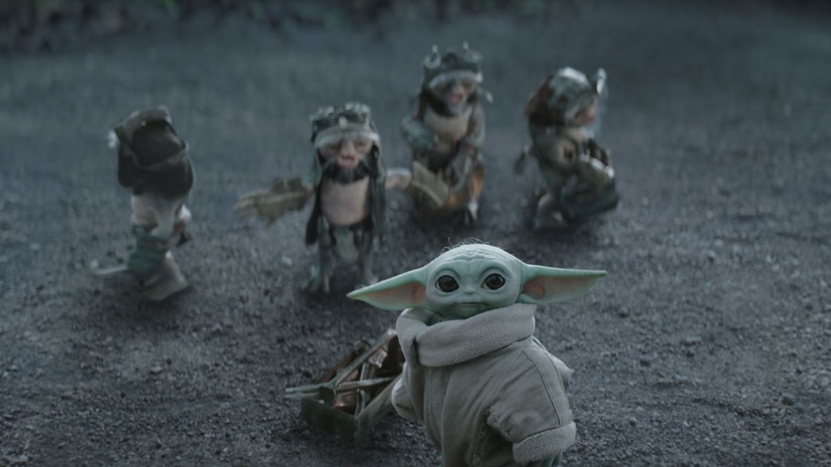 Baby Yoda and the Ancellans looking up at something in The Mandalorian and Grogu