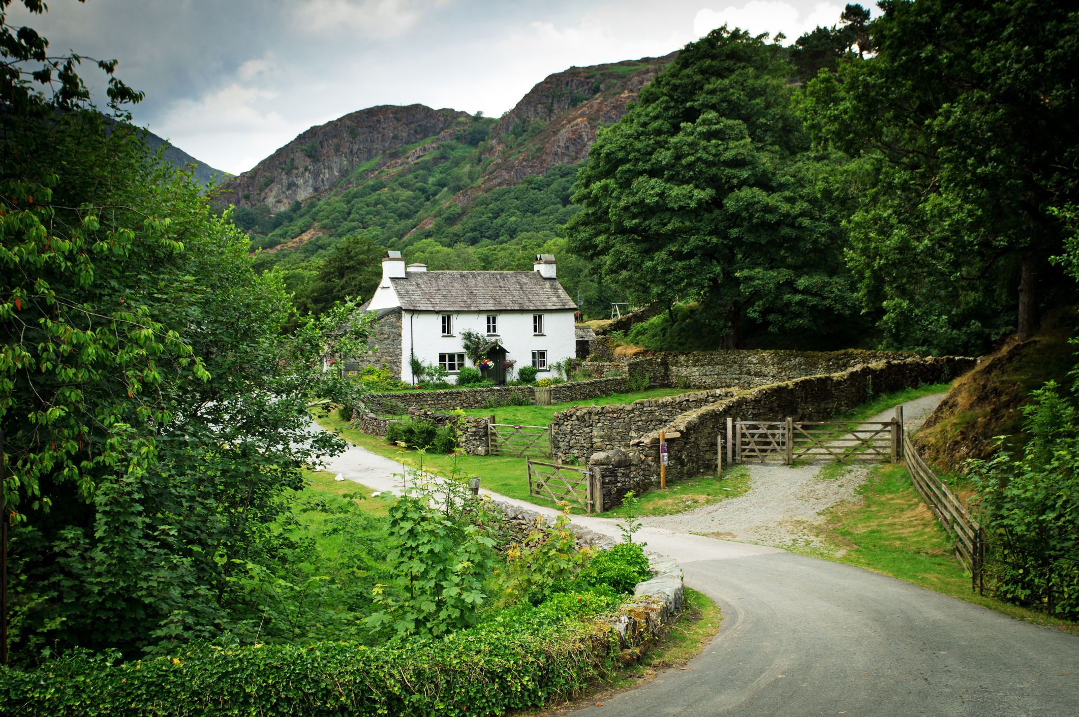 Cottage or farmhouse in a typical Lake District setting