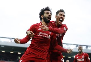 Mohamed Salah and Roberto Firmino show their lead after Liverpool take the lead against Tottenham
