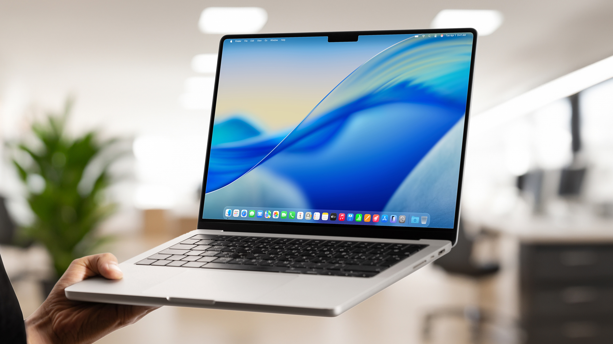 macOS Tahoe 26 desktop screen on an MacBook