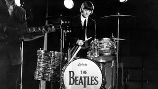 Ringo Starr playing the drum for The Beatles