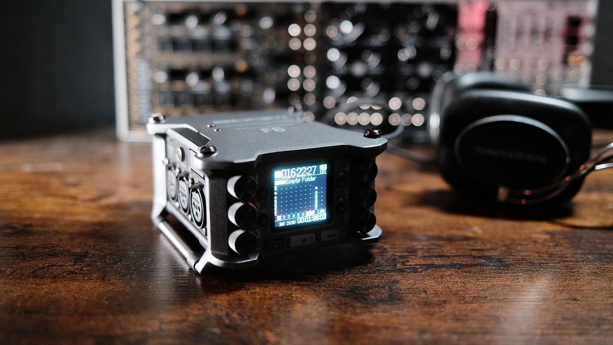 A Zoom F6 audio field recorder on a desk