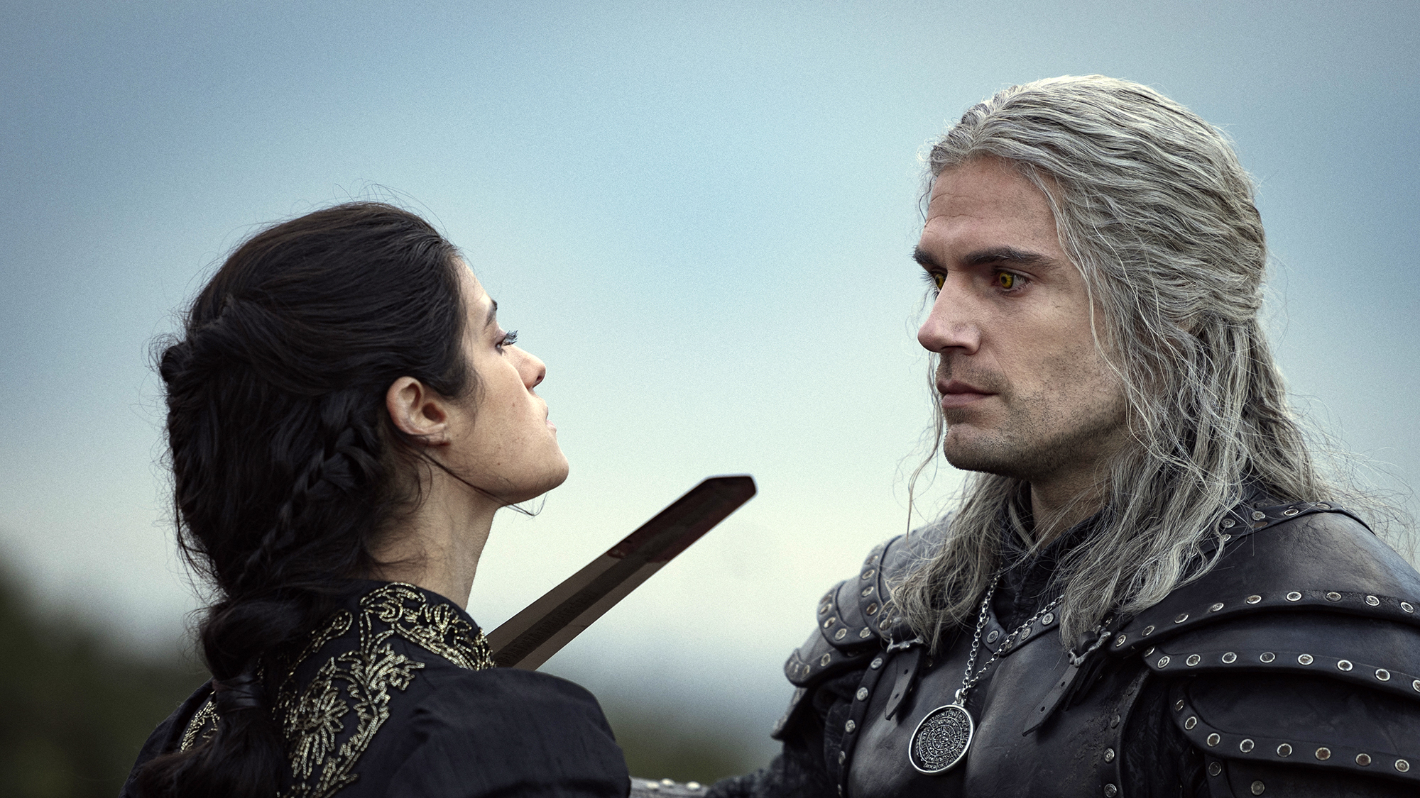 Henry Cavill as Geralt and Anya Chalotra as Yennefer in The Witcher on Netflix
