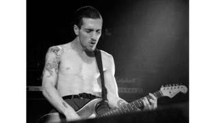 : American musician John Frusciante, of the American rock band Red Hot Chili Peppers, performs on stage during the Blood Sugar Sex Magik Tour on November 11, 1991 at the Roseland Ballroom in New York, New York