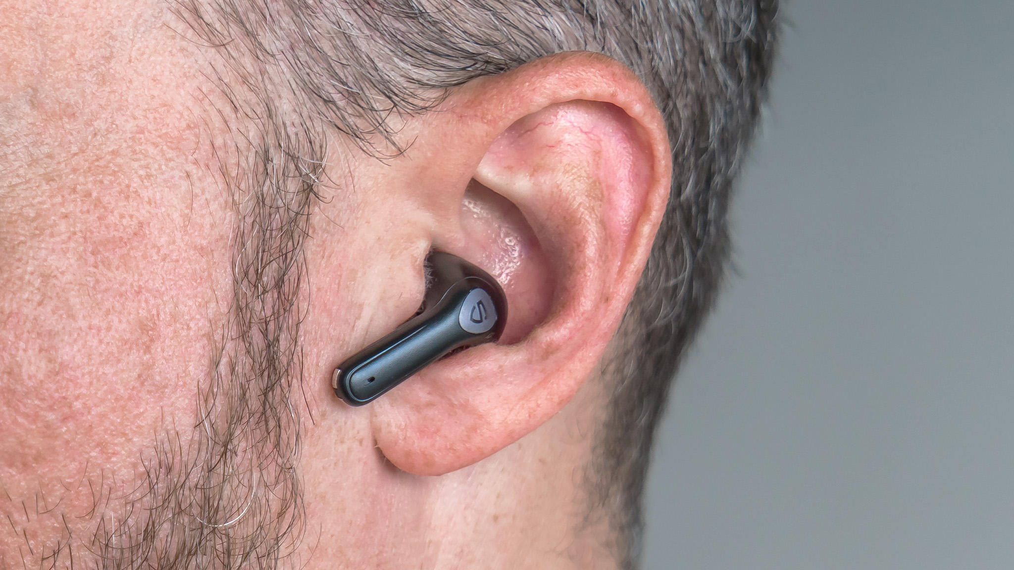Close up view of Soundpeats Air3 Pro earbud.