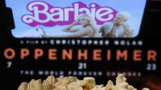 The title cards of Barbie and Oppenheimer side-by-side