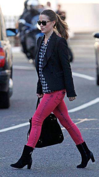 Pippa Middleton wearing coral skinny jeans